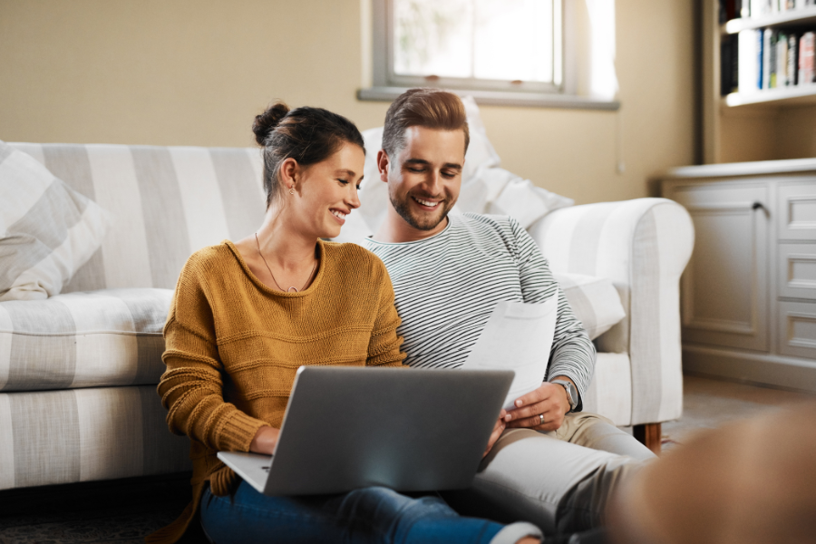 a young couple strategizing on how to lower your credit score