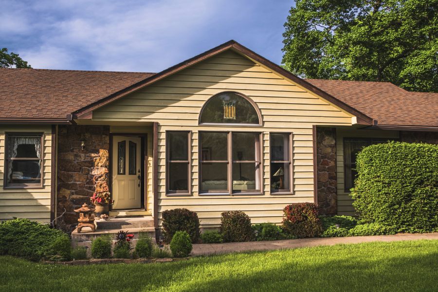 Street view of a suburban house that was financed with a 401k