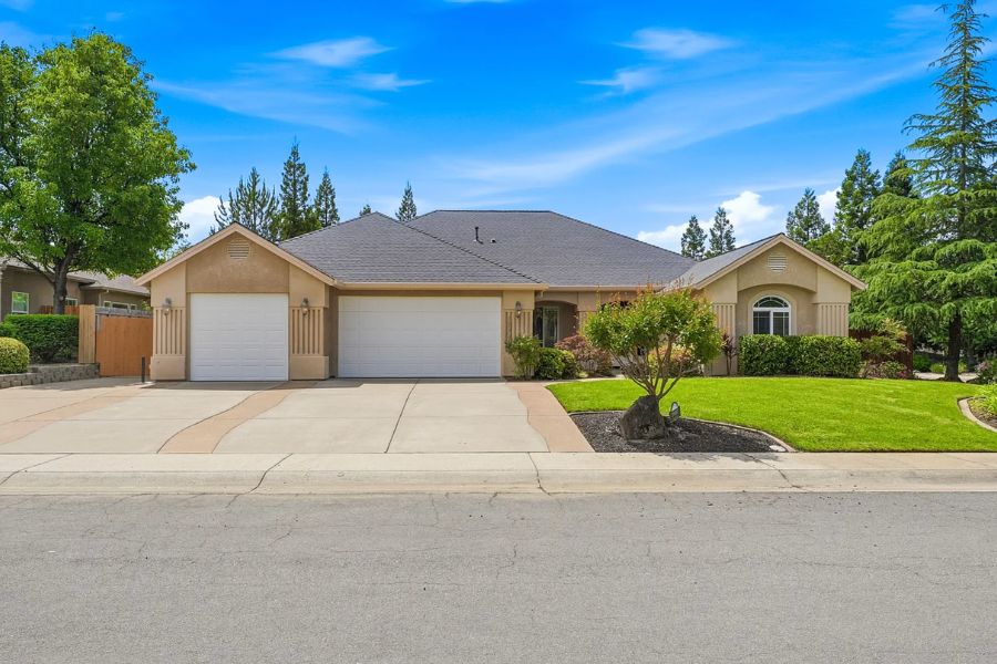 street view of a home for sale in Redding CA with a beautiful front lawn