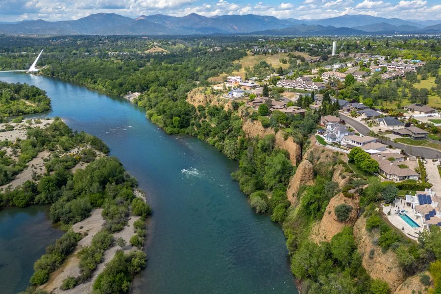 riverfront homes for sale in redding with the Sundial Bridge in the background